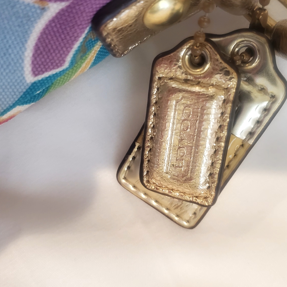 Coach Gold and Vibrant Floral Bag